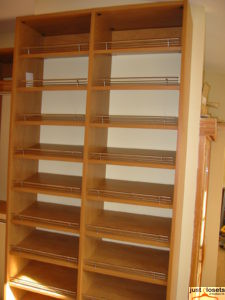 Shoe rack storage in master bedroom closet