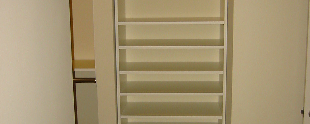 Closet built-in with many shelves for clothing items