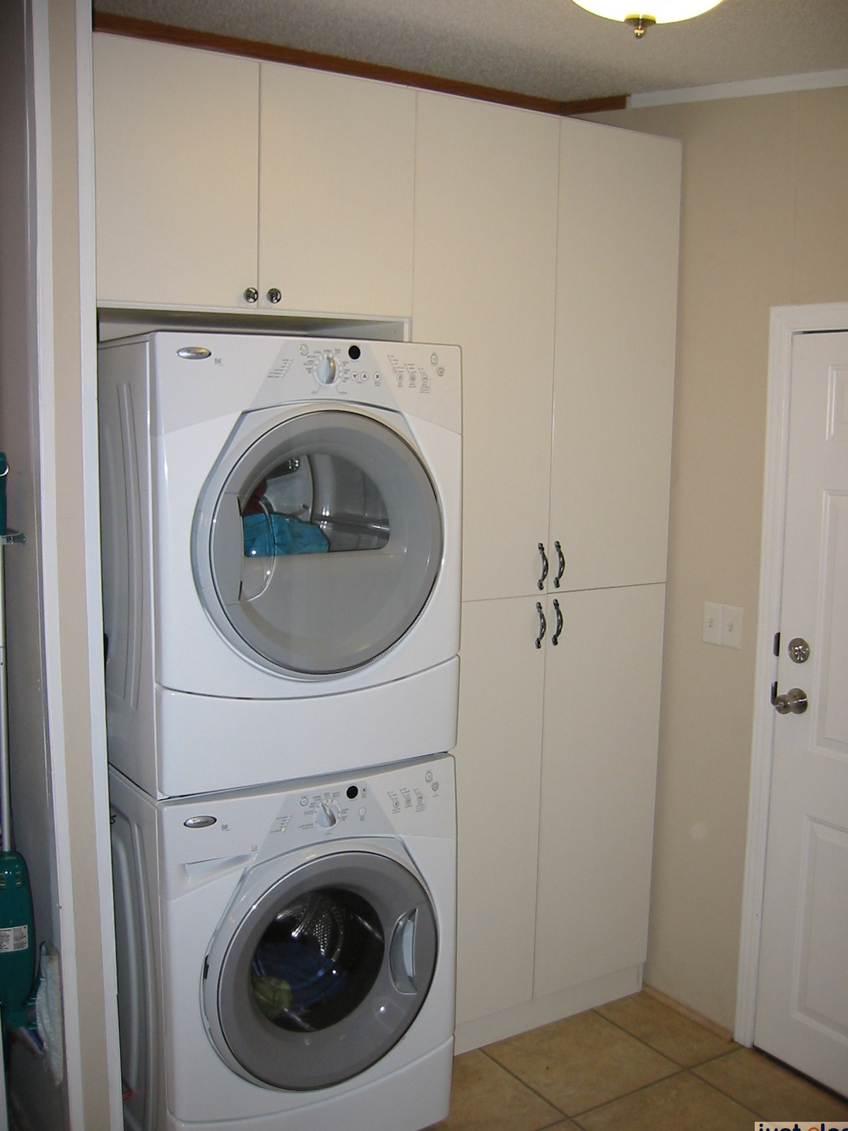Custom Designed Laundry Room Storage System - Just Closets